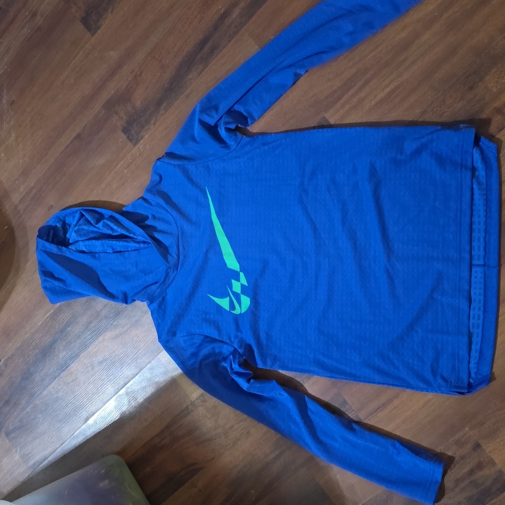 Boys Long Sleeve Blue Nike Hoodie with Green Nike Check. Size L.